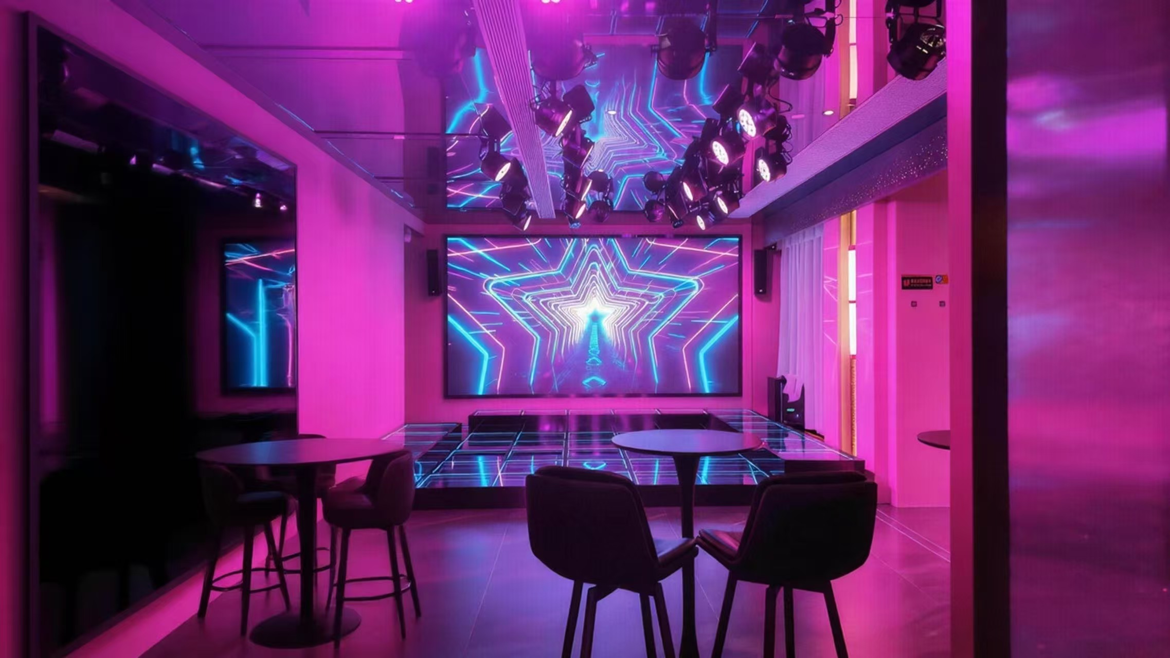 Entertainment hall with professional stage lighting and LED screens